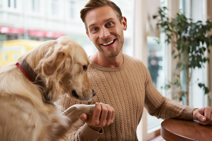 Photo of a happy dog and owner.
